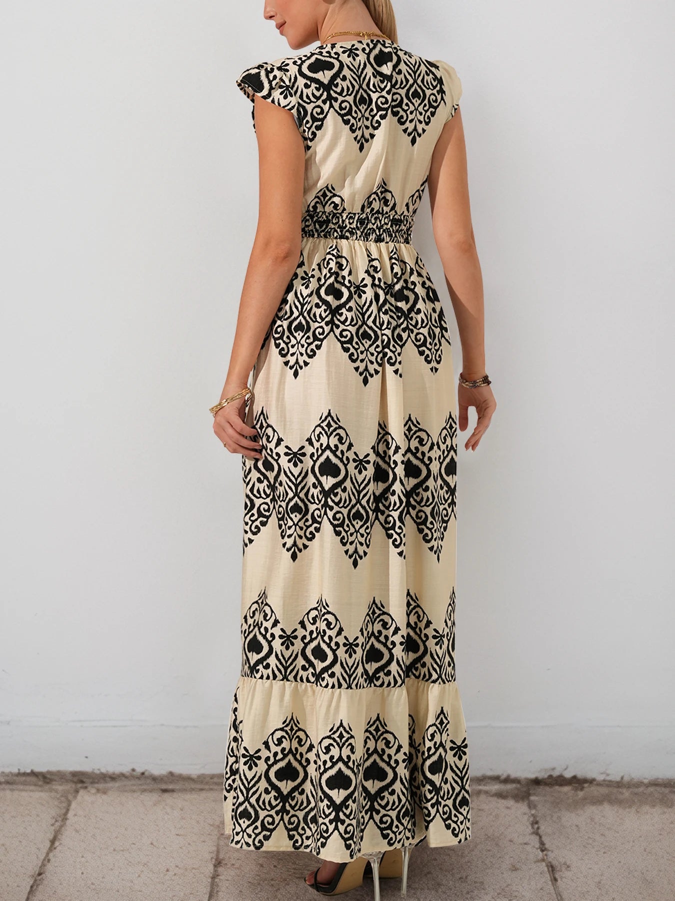 The new ethnic-style printed vacation dress with flying sleeves and a high waist is a hot sale for women in the summer of 2025